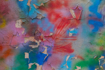 multi-colored concrete wall, colored stains on white plaster