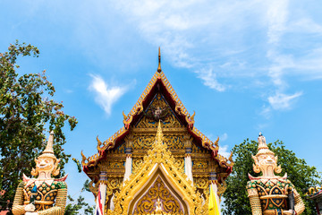 Fototapeta premium Temple roof. Architectural detail on roof of Thai temple. Beautiful architecture in Ancient buddhist temple