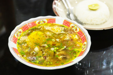 Soto ayam (Indonesian chicken noodle soup) is a yellow spicy chicken soup with lontong or nasi himpit or ketupat and/or vermicelli or noodles, commonly found in Indonesia.