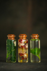 flavored oil (herbs, flowers, other spices and aromas). food background. top