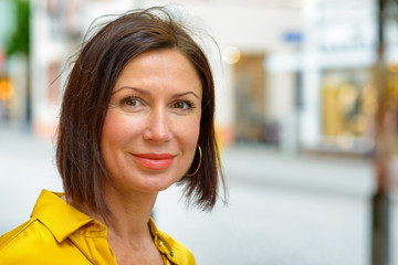 Attractive brunette woman smiling at the camera