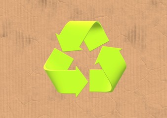 green recycle arrows symbol on cardboard