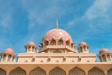 Beautiful blue sky contrast pink color of Putra  Mosque at Kuala Lumpur, Malaysia - 271468025