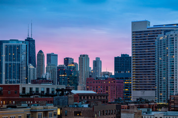 Fototapeta na wymiar Colorful sunrise in the city. Cityscape of Chicago in the early morning.