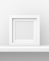 Square white picture frame on a white wooden shelf against a white wall. 3d render. Front view. Home Interiors Series.