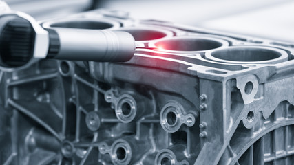Repair motor block of cylinders, operator inspection dimension aluminium automotive par in...