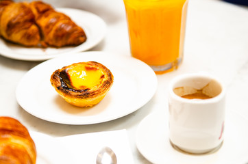sweet portuguese pastries on plate