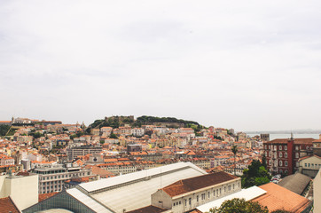 Fototapeta na wymiar beautiful view to Lisbon city, architecture and red roofs