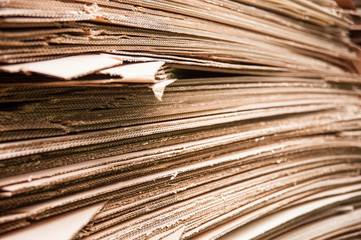 Corrugated cardboard sheets lie on one another. Printing industry