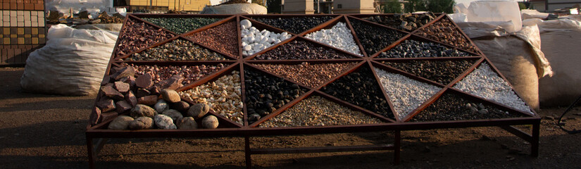 Pallets with natural facing stone and cobblestones