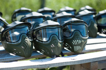 Special protective mask for playing paintball with traces and spot of hit of a ball with paint....