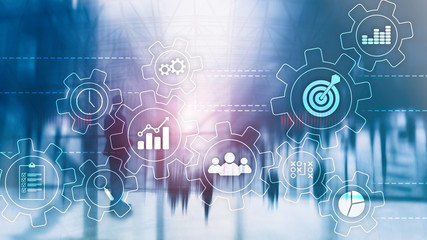 Business process automation concept. Gears and icons on abstract background