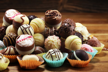 a lot of variety chocolate pralines, belgian confectionery gourmet chocolate praline.