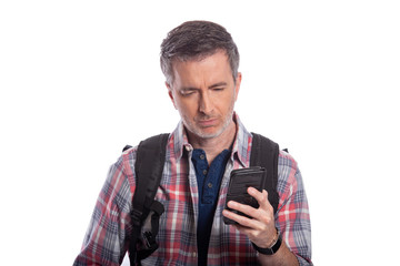 Tourist or traveling hiker unable to get cellphone reception or network.  The man can't make a call...