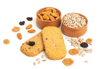 Almonds, seeds and raisins in a wooden bowls.