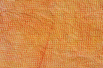 orange crayon pattern on paper background texture