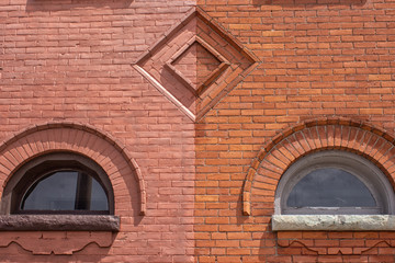 Brick Wall with Lunette Windows and Diamond Pattern