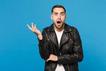 Young sad frustrated worried unshaven man in black jacket white t-shirt looking camera isolated on...