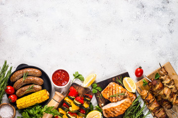 Barbeque dish - Grilled meat, fish, sausages and vegetables.  - obrazy, fototapety, plakaty