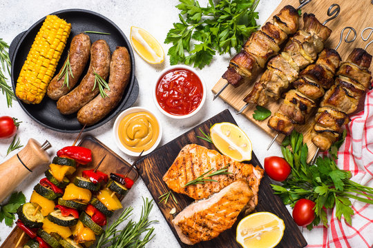 Barbeque Dish - Grilled Meat, Fish, Sausages And Vegetables. 