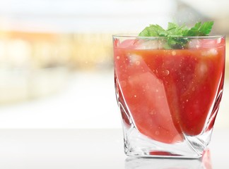 Glass of alcohol cocktail on white background, bloody Mary.