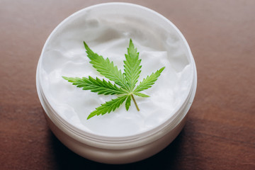 Cannabis oinment natural product. Cosmetic cream from natural hemp, moisturizing lotion with CBD...