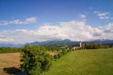 Fototapeta na wymiar Pilgrimage Church Irschenberg Wilparting with mountain view