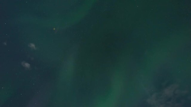 Timelapse of amazing Northern Lights at Lake Myvatn at night with beautiful landscape in view