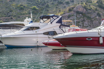 boats in the parking lot at the pier