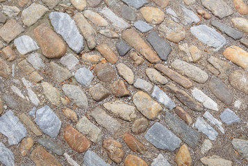 Old cobblestone road of big stones.