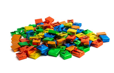 Fototapeta premium candy in a multi-colored wrapper isolated