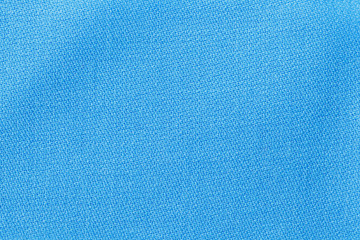 Obraz premium The linen cloth in blue color. Fabric background texture. Detail of textile material close-up