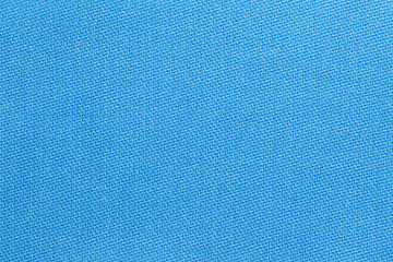 Fototapeta na wymiar The linen cloth in blue color. Fabric background texture. Detail of textile material close-up