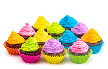 Rainbow Colored Frosted Chocolate Cupcakes on a White Background