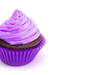 A Single Purple Iced Chocolate Cupcake Isolated on a White Background