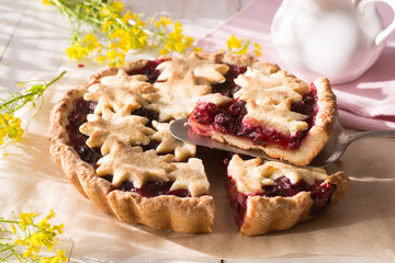 Cherry tart on wooden table