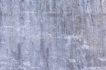 Gray abstract background, stray leaf sheet of slate with cracks and scratches. The basis for the layout. Light photo.