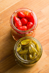 Pickled chili peppers and jalapeno peppers.