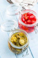 Pickled chili peppers and jalapeno peppers.