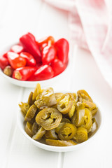 Pickled chili peppers and jalapeno peppers.