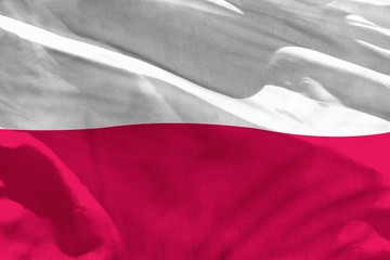Waving Poland flag for using as texture or background, the flag is fluttering on the wind