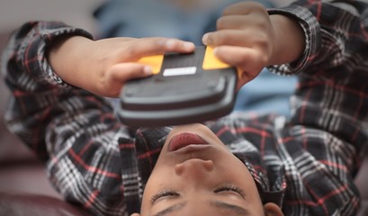 Young boy playing video game