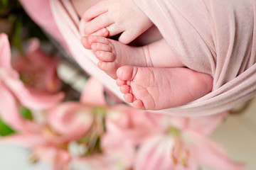 Newborn Baby Girl Feet in Wrap
