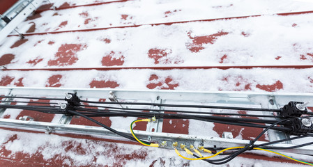 Cable tray outside with telecommunications cables, ground cables, optic fiber, power cables and...