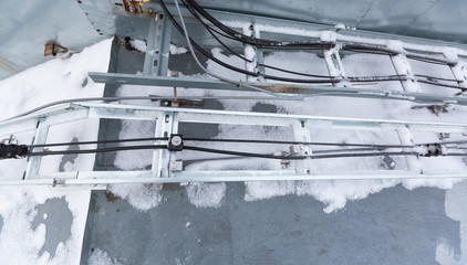 Cable tray outside with telecommunications cables, ground cables, optic fiber, power cables and...