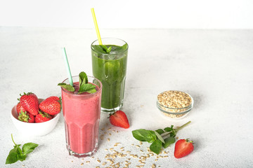 Organic berry and vegetable smoothie with oatmeal on a light background copy space. Healthy food. Lactose free diet.