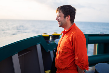 Fototapeta premium Deck Officer on deck of offshore vessel or ship. Work at sea