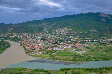Fototapeta na wymiar The merger of two rivers Mtkvari and Aragvi in Mtskheta, Georgia
