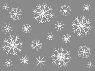 Naklejka na ściany i meble Decorative white snowflakes on a gray background.