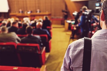 People in a Room for a Seminar / Meeting / Conference